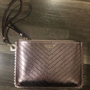 Victoria Secret metallic pink wristlet.